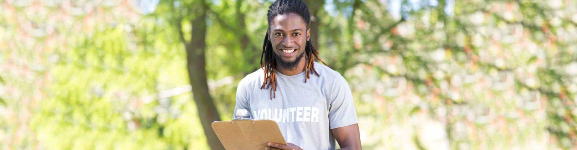 a volunteer smiling